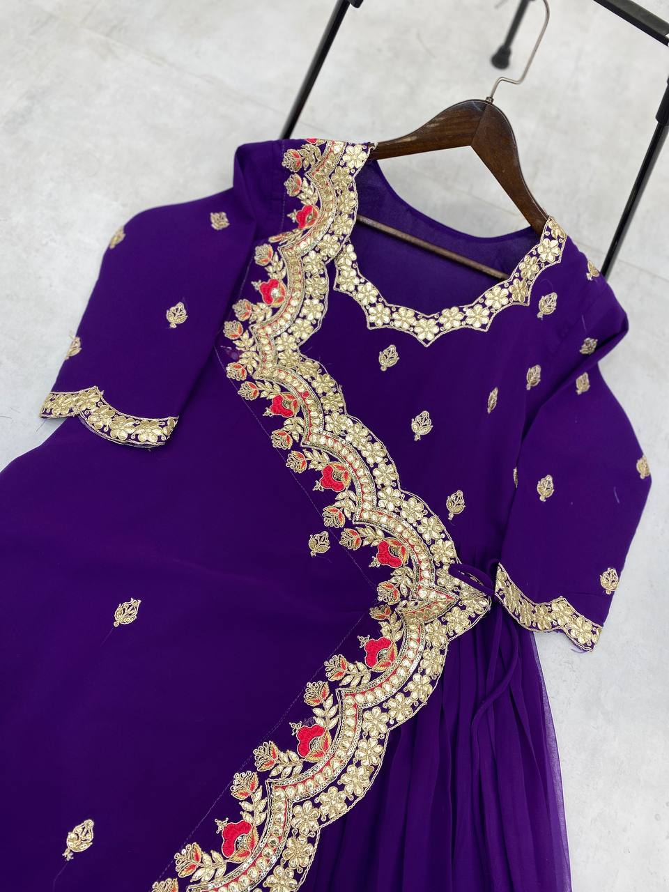 "Elegant Faux Georgette Gown with Intricate Embroidery & Silk Inner"