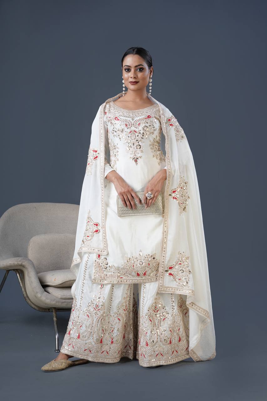 "Elegant Chinnon Silk Ensemble with Heavy Embroidery and Sequence Work"