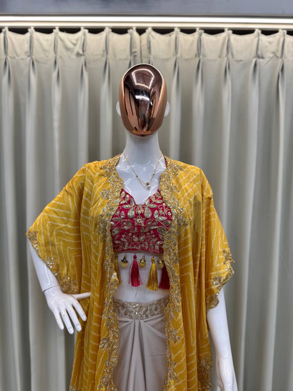 "Elegant Sequence Embroidered Ensemble: Tube Blouse, Draped Skirt & Shrug"