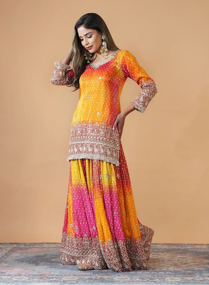 “Chinon Silk Ensemble with Mirror Work & Sequins: Elegant Top, Plazo, and Dupatta Set”
