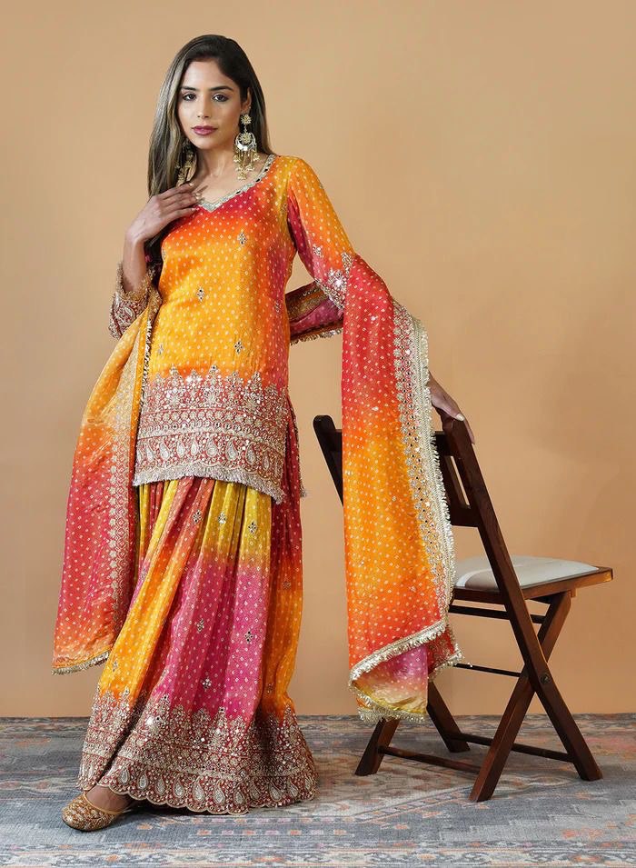 “Chinon Silk Ensemble with Mirror Work & Sequins: Elegant Top, Plazo, and Dupatta Set”