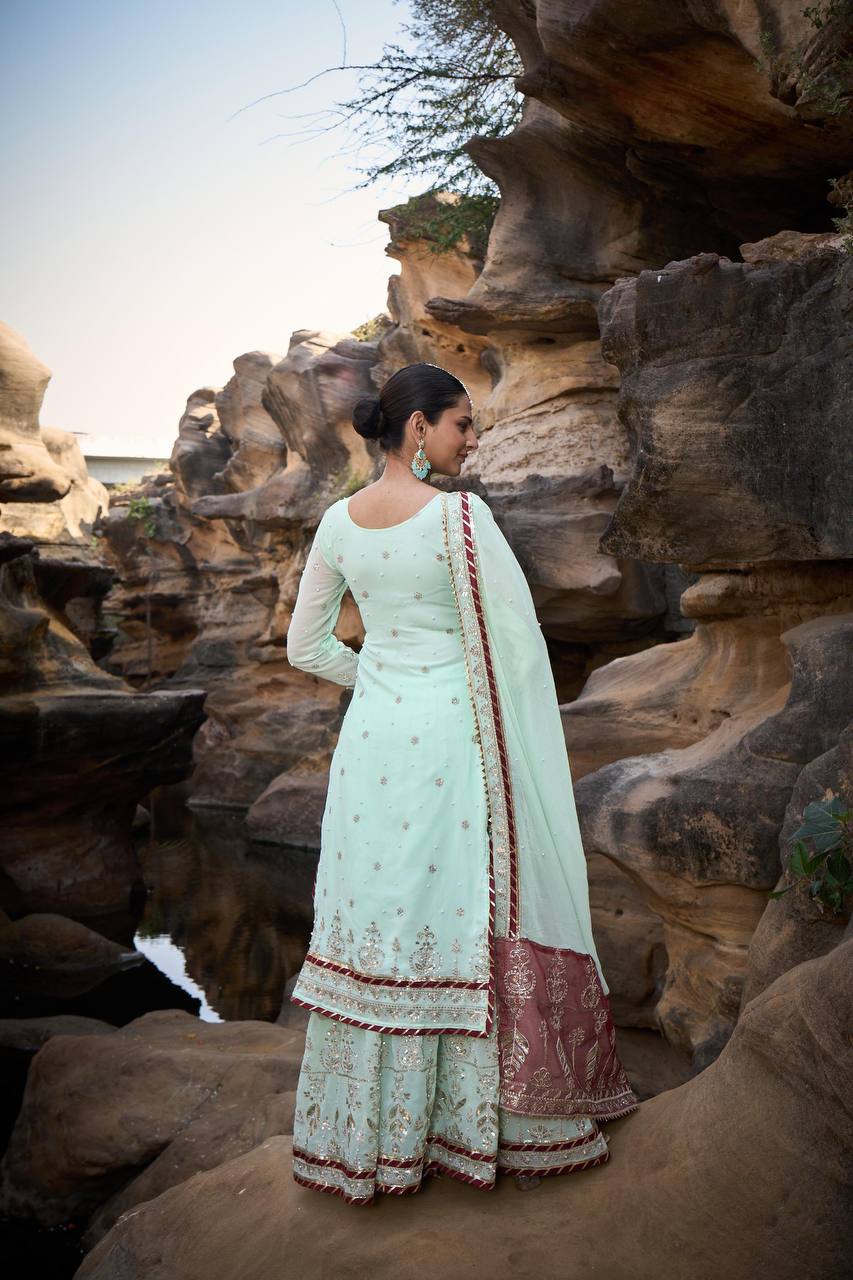 "Elegant Foux Gorgette Sharara Set with Intricate Thread and Sequence Work"