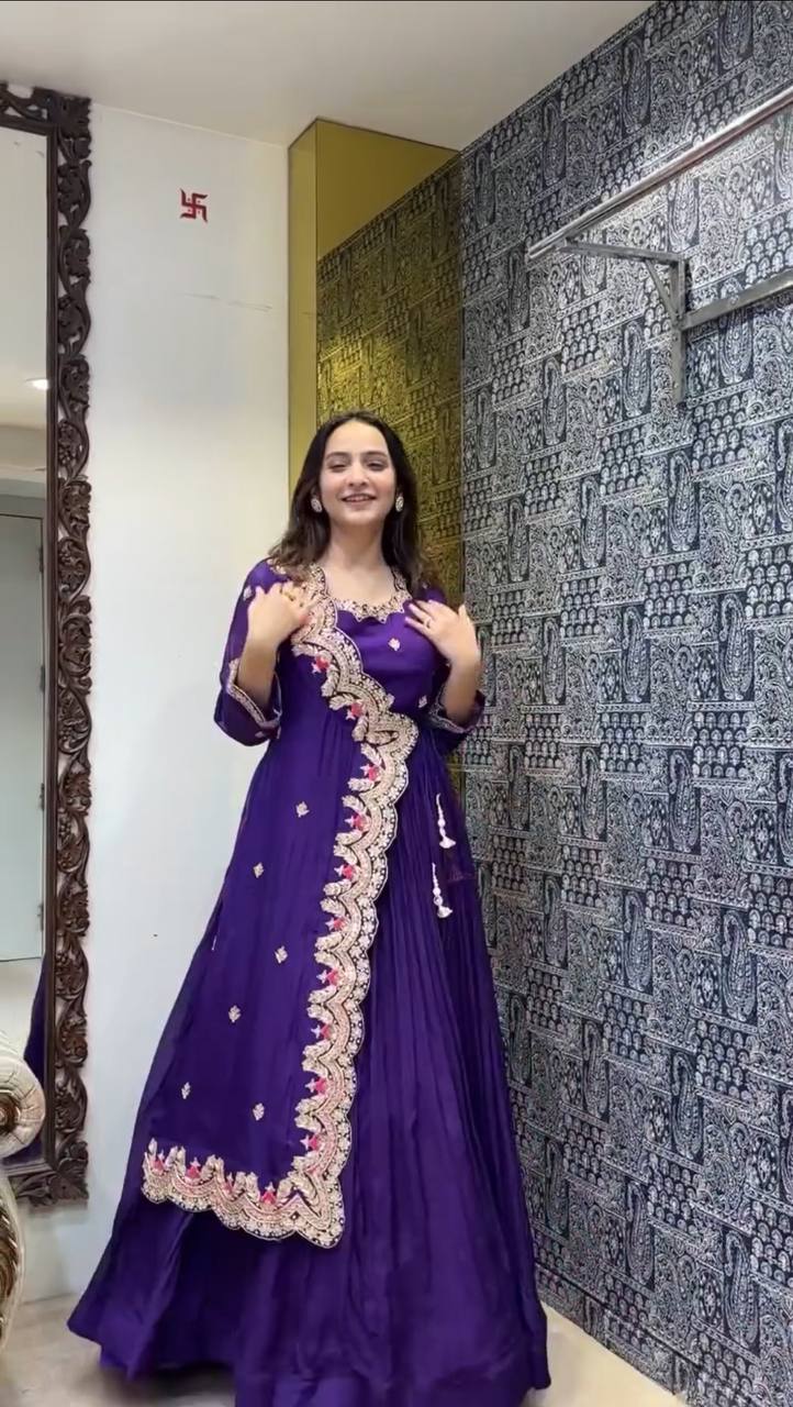 "Elegant Faux Georgette Gown with Intricate Embroidery & Silk Inner"