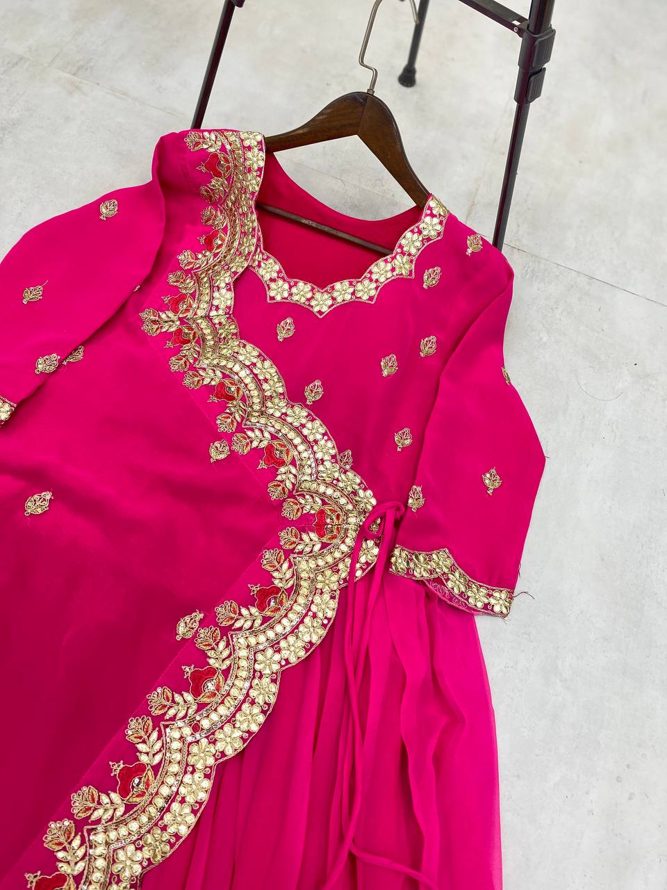 "Elegant Faux Georgette Gown with Intricate Embroidery & Silk Inner"