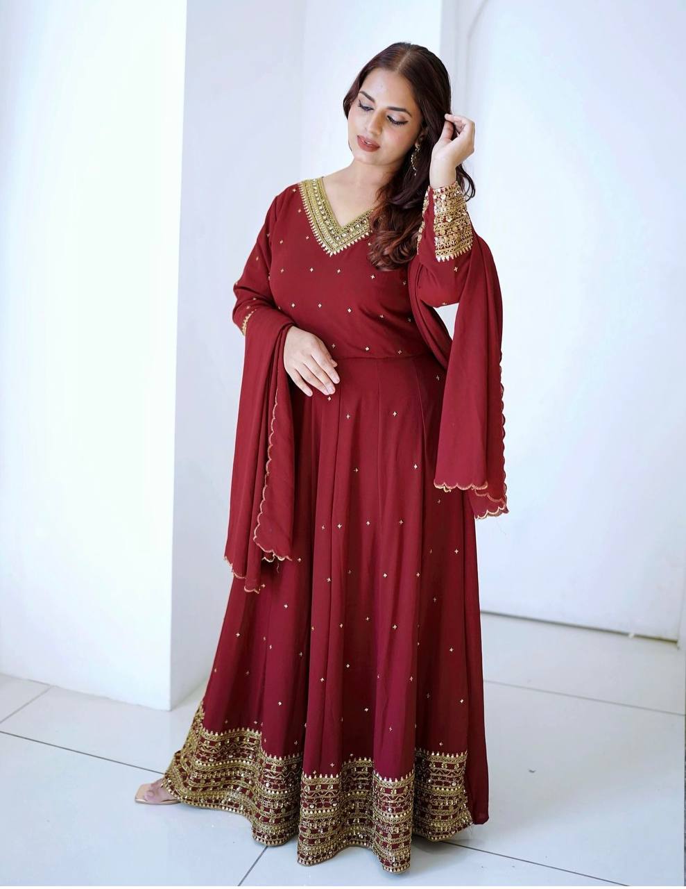 "Elegant Fox Georgette Gown with Heavy Embroidery and Sequins"