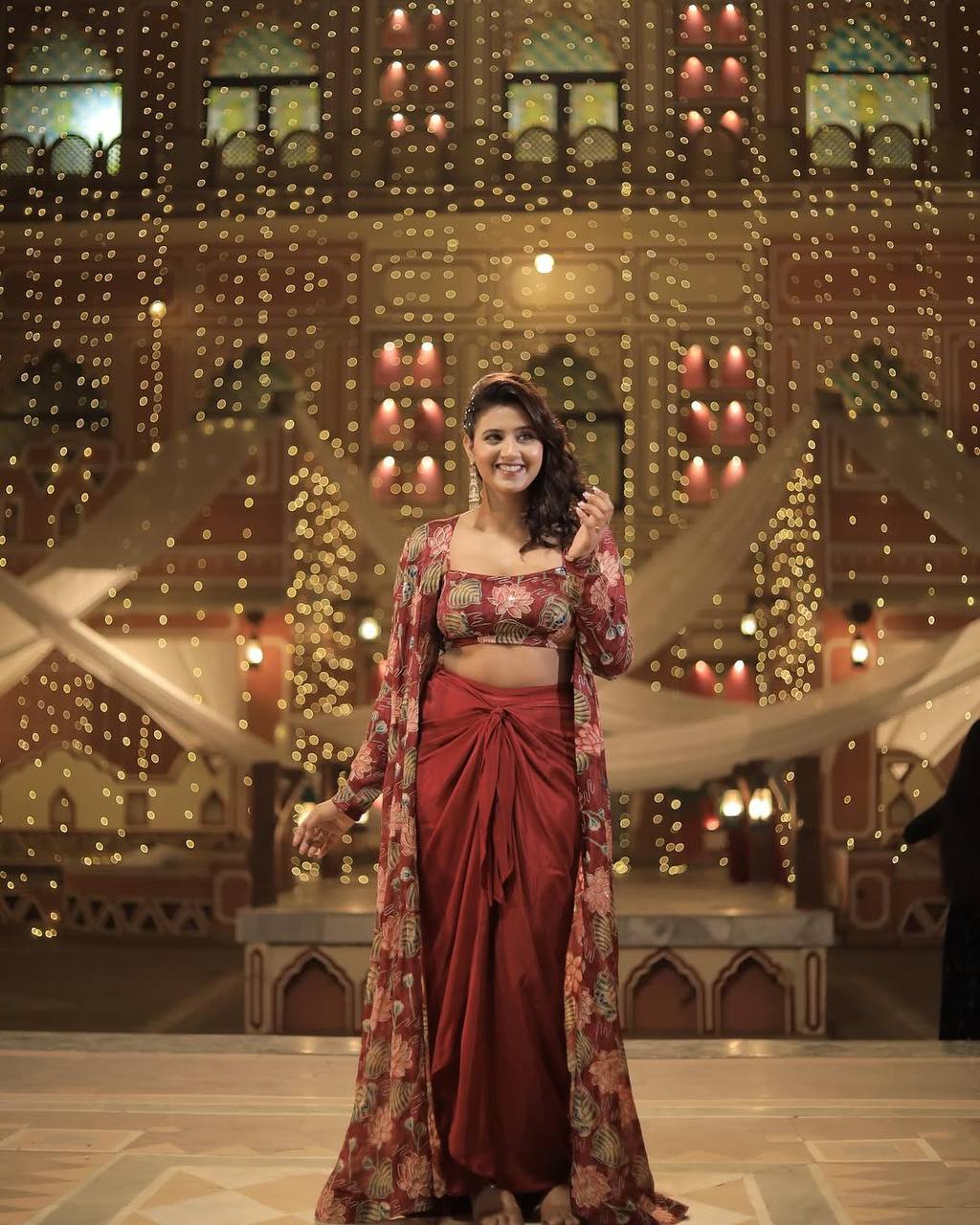 "Elegant Printed Crêpe Silk Ensemble with Draped Skirt and Shrug"