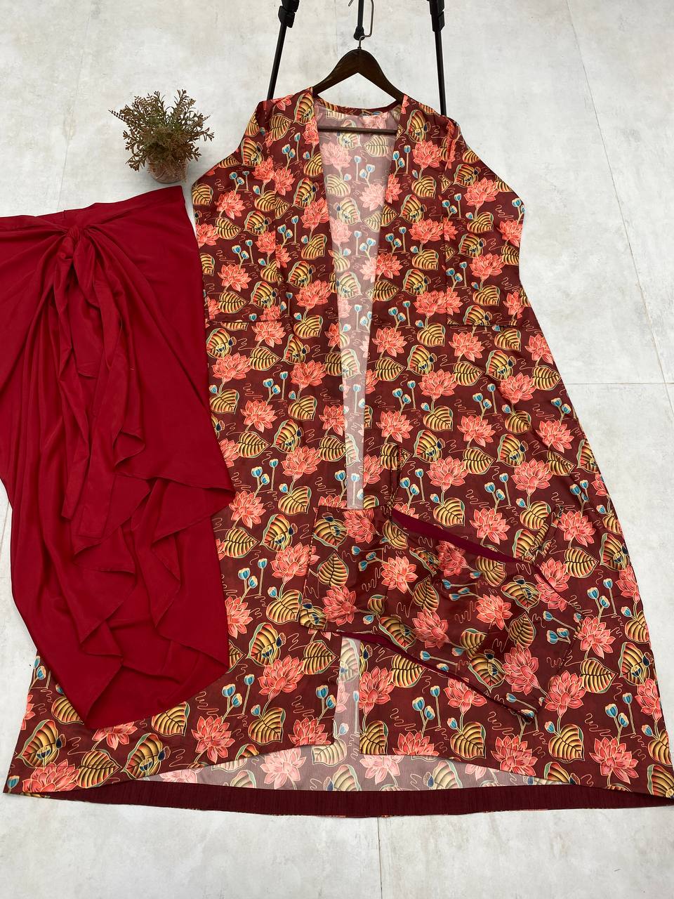 "Elegant Printed Crêpe Silk Ensemble with Draped Skirt and Shrug"