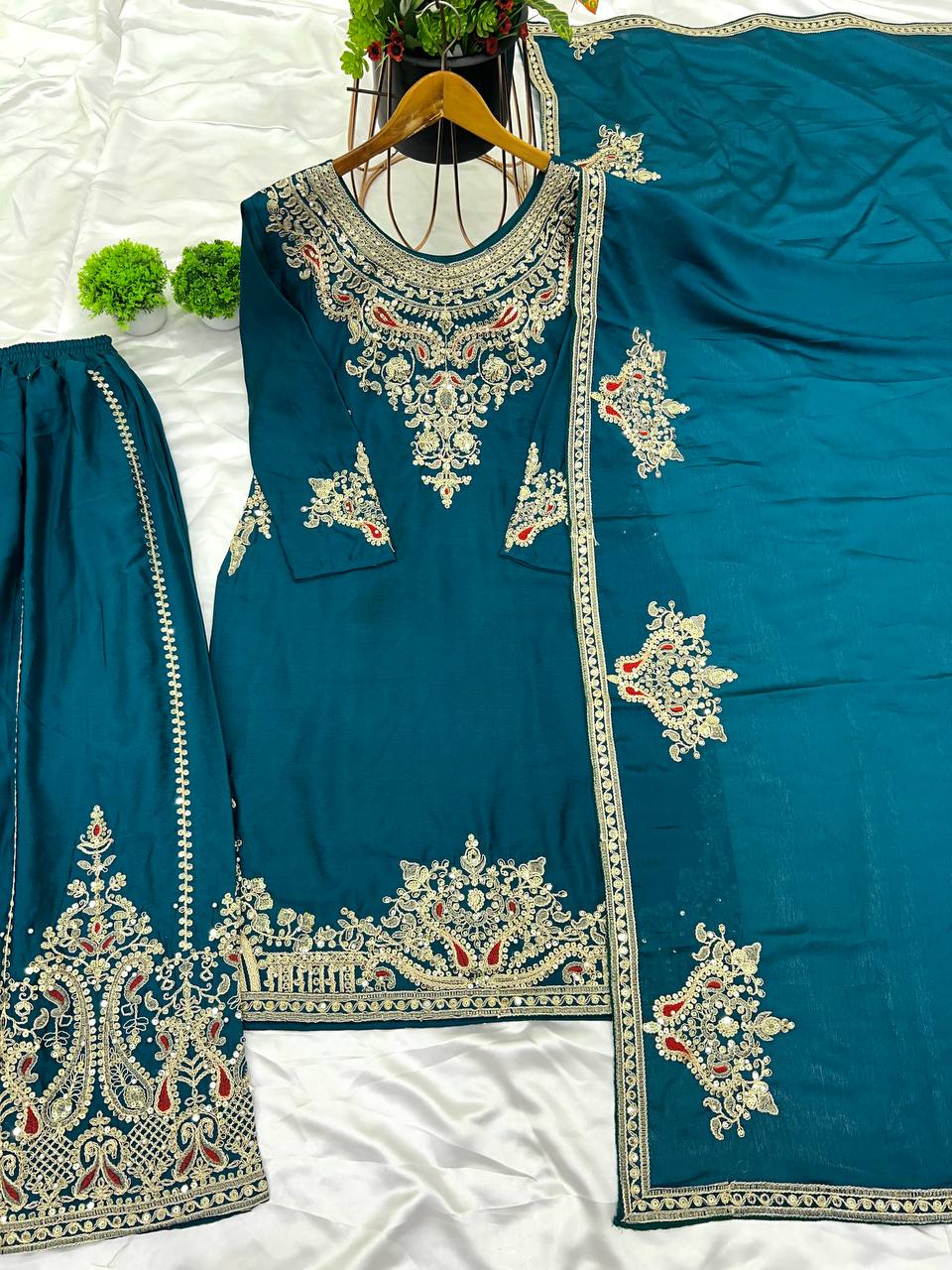 "Elegant Chinnon Silk Ensemble with Heavy Embroidery and Sequence Work"