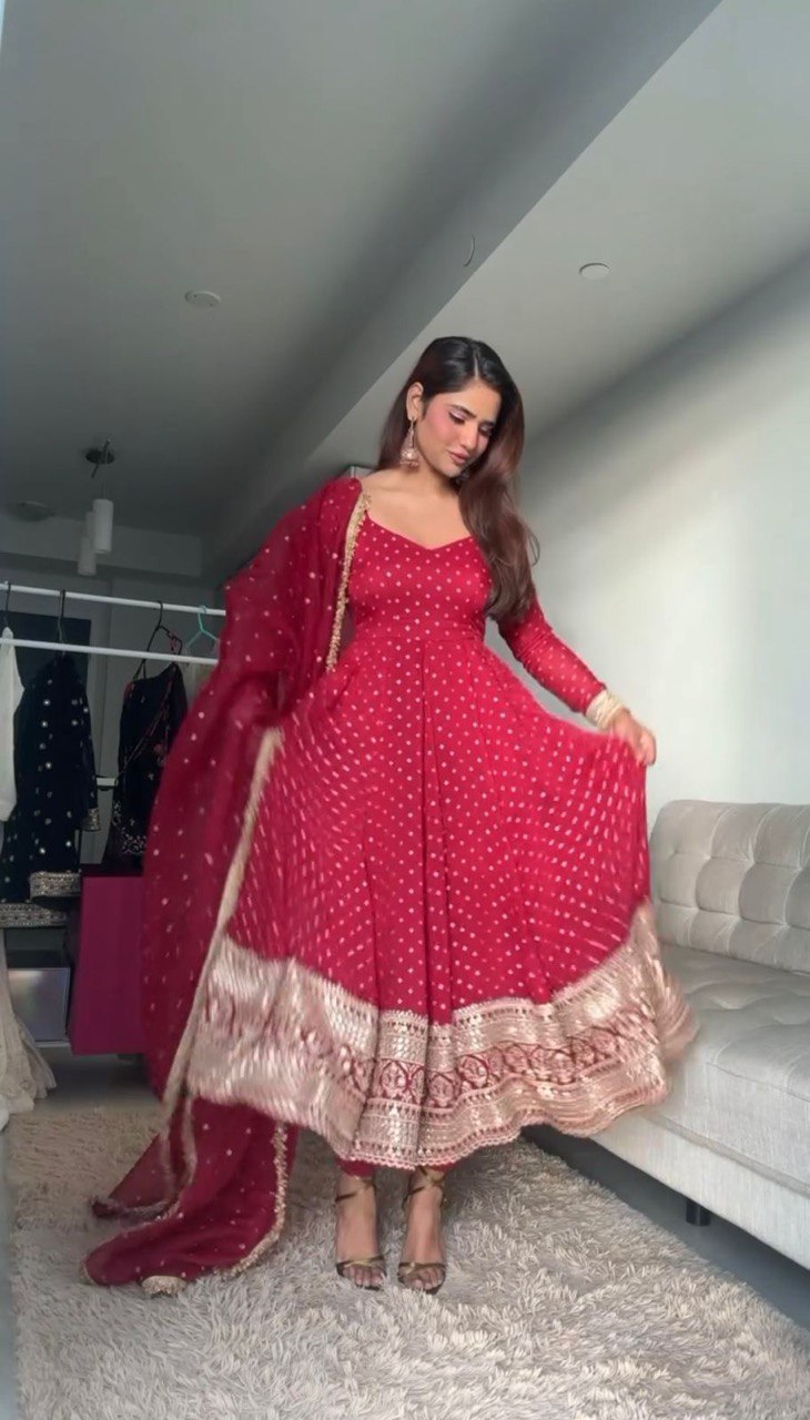 "Elegant Thread Work Set with Sequence Detailing and Lace Borders"