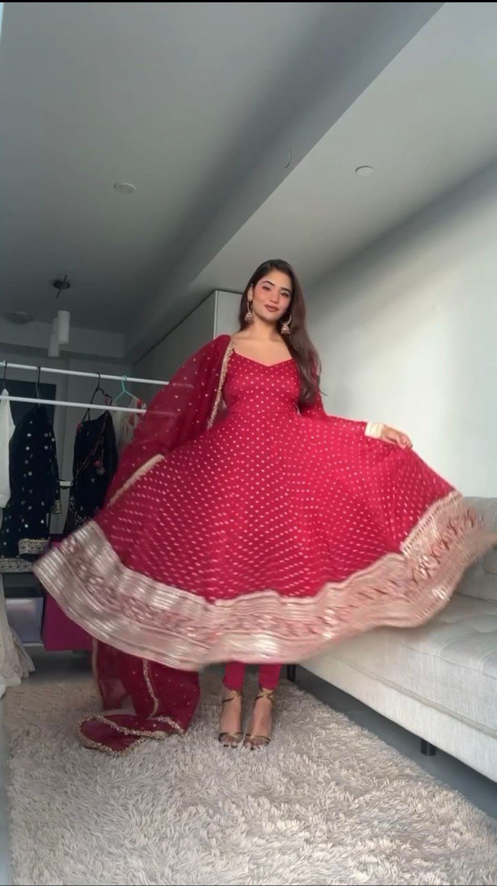 "Elegant Thread Work Set with Sequence Detailing and Lace Borders"