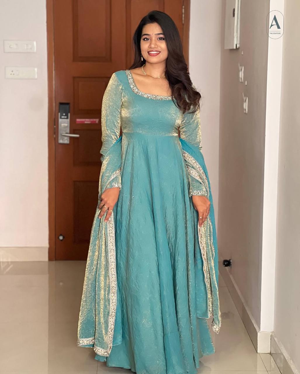 "Royal Elegance: Heavy Fandy Silk Gown with Embroidery Sequence Work & Full Flair"