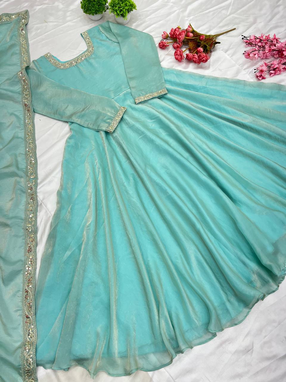 "Royal Elegance: Heavy Fandy Silk Gown with Embroidery Sequence Work & Full Flair"