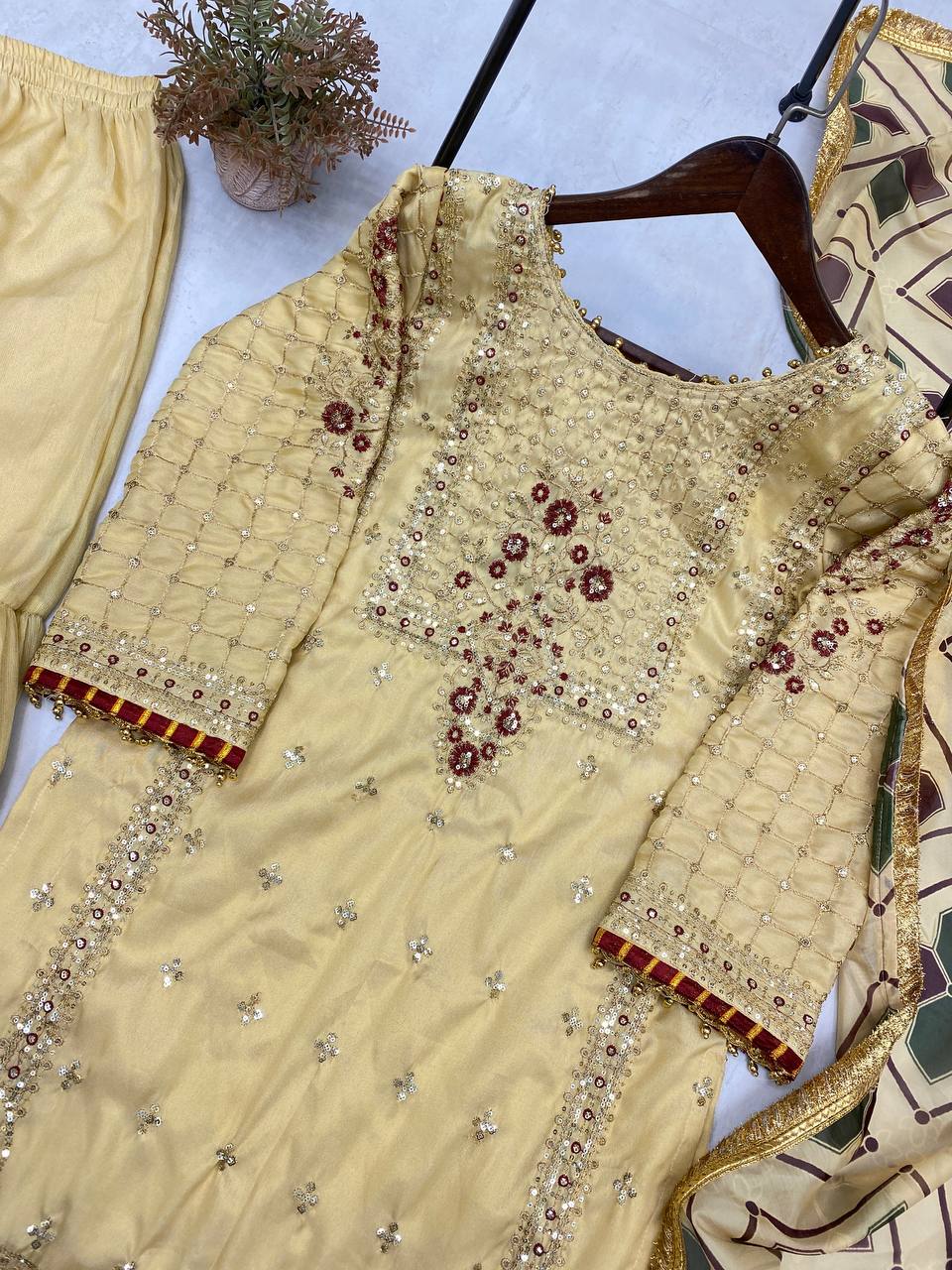 "Embroidered Cosmos Silk Sharara Set with Organza Dupatta and Golden Lace"
