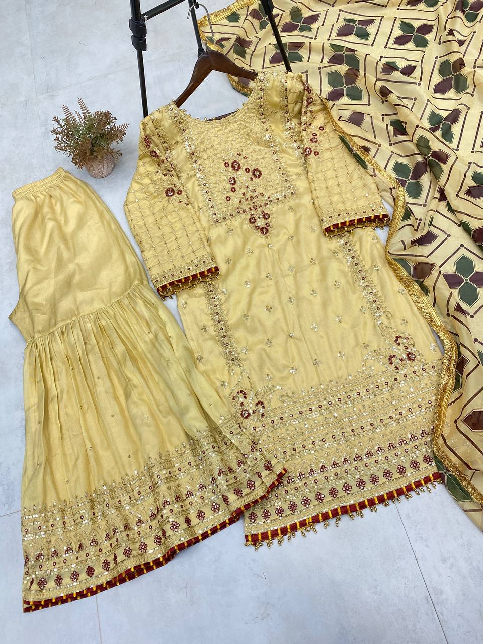 "Embroidered Cosmos Silk Sharara Set with Organza Dupatta and Golden Lace"