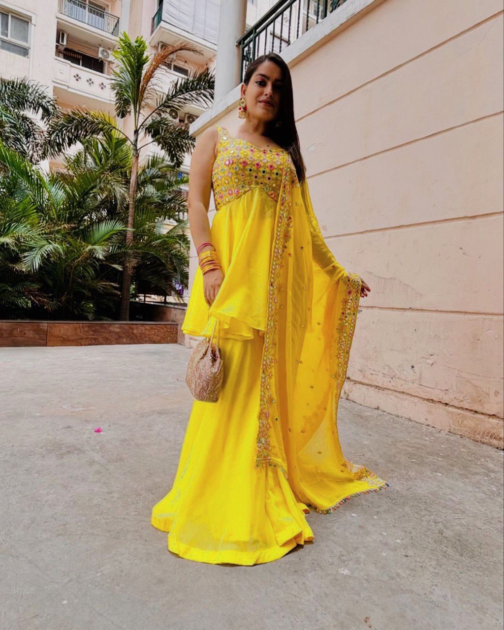 "Elegant Foux Gorgette Ensemble with Thread Work & Sequence Detailing"