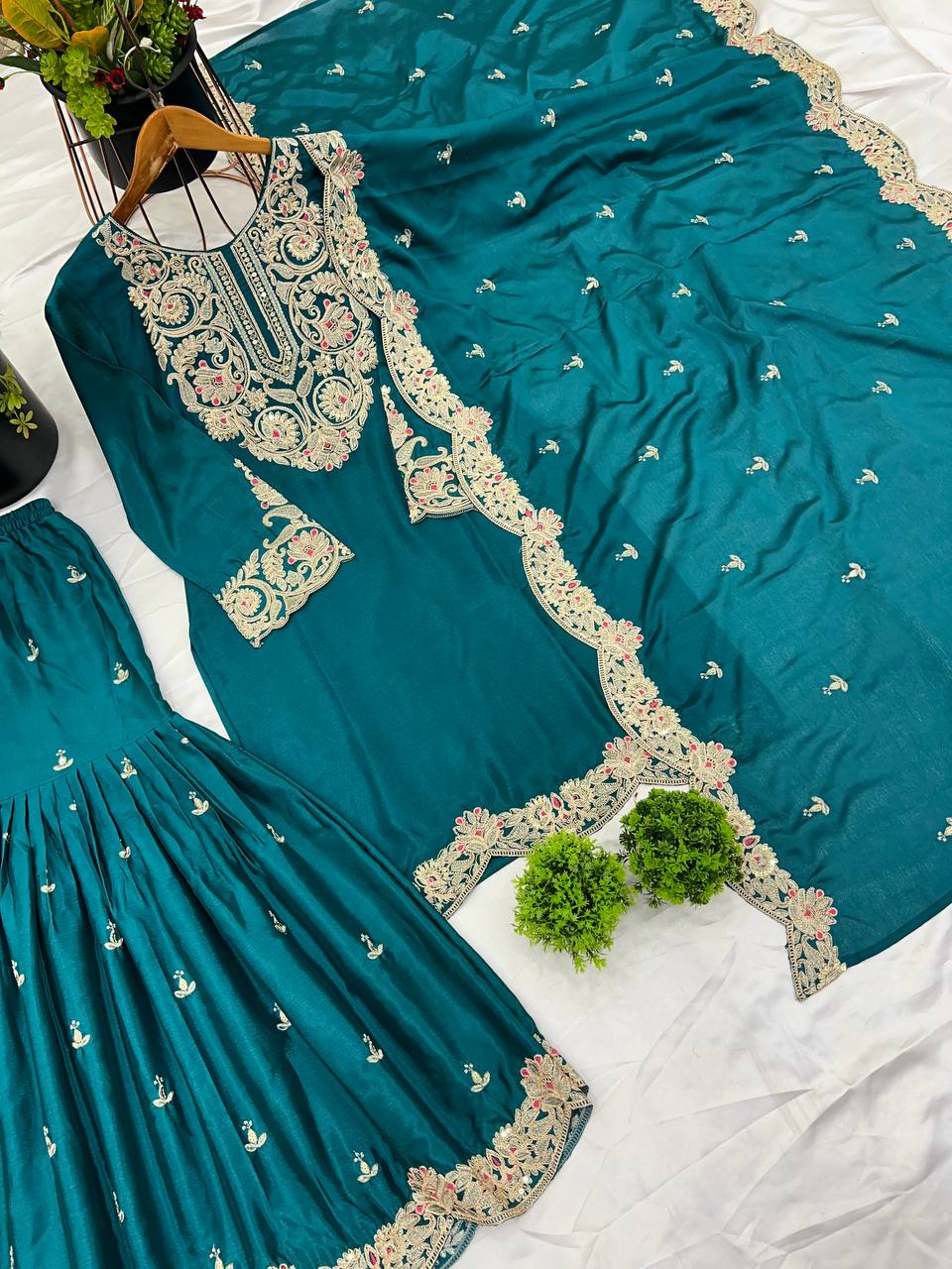 "Elegance Redefined: Pure Chinnon Silk Embroidered Top, Plazzo & Dupatta Set"