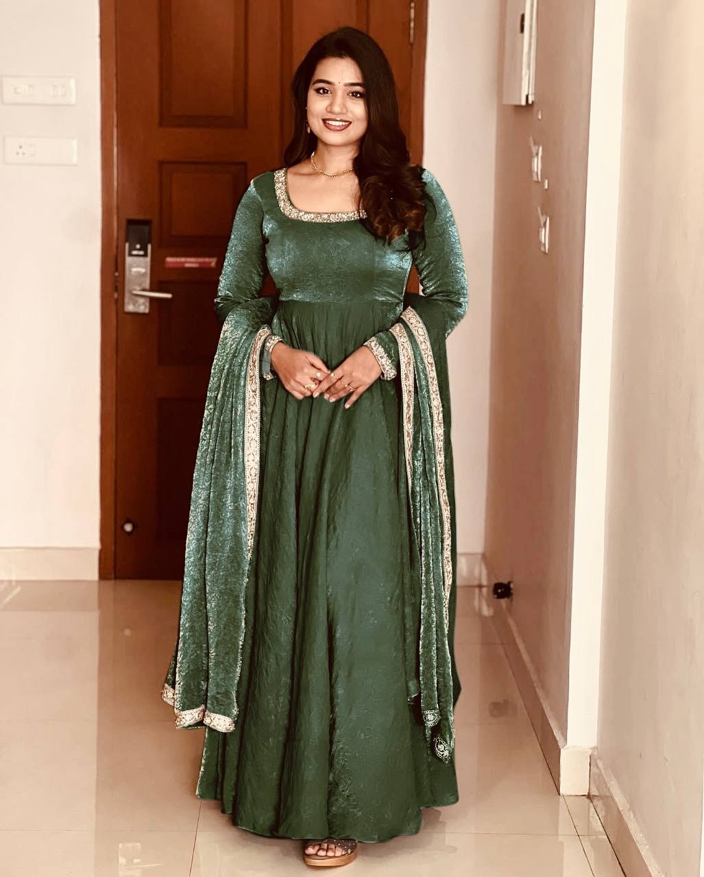 "Royal Elegance: Heavy Fandy Silk Gown with Embroidery Sequence Work & Full Flair"