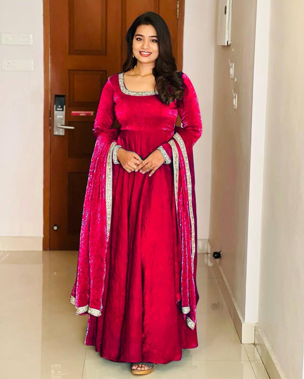 "Royal Elegance: Heavy Fandy Silk Gown with Embroidery Sequence Work & Full Flair"