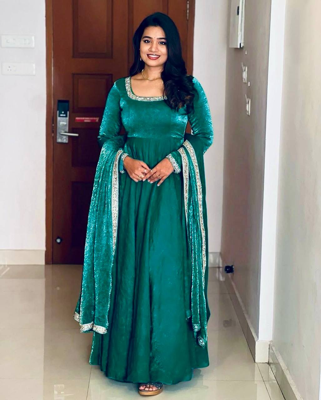 "Royal Elegance: Heavy Fandy Silk Gown with Embroidery Sequence Work & Full Flair"