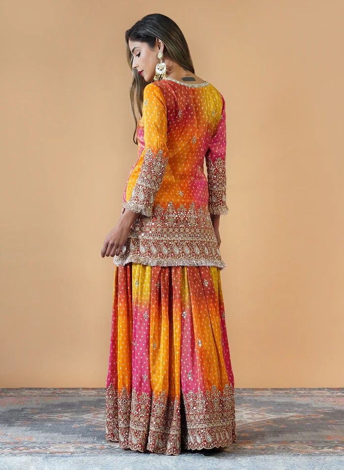 “Chinon Silk Ensemble with Mirror Work & Sequins: Elegant Top, Plazo, and Dupatta Set”