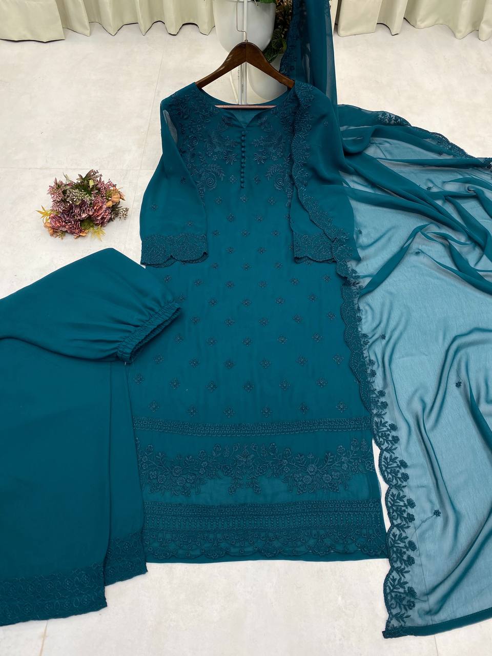 "Embroidered Georgette Top, Pant, and Dupatta Set with Elegant Detailing"